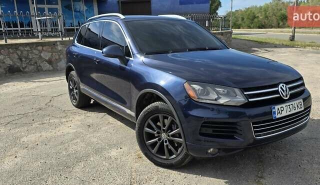 Синий Фольксваген Туарег, объемом двигателя 3 л и пробегом 214 тыс. км за 17900 $, фото 4 на Automoto.ua