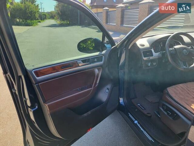 Синий Фольксваген Туарег, объемом двигателя 2.97 л и пробегом 221 тыс. км за 21400 $, фото 27 на Automoto.ua