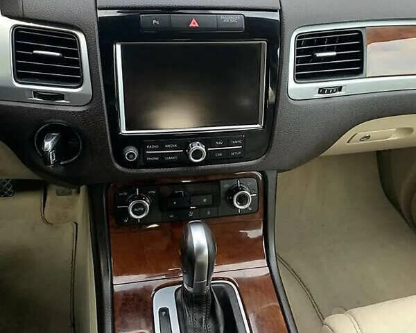 Синий Фольксваген Туарег, объемом двигателя 2.97 л и пробегом 374 тыс. км за 18900 $, фото 3 на Automoto.ua