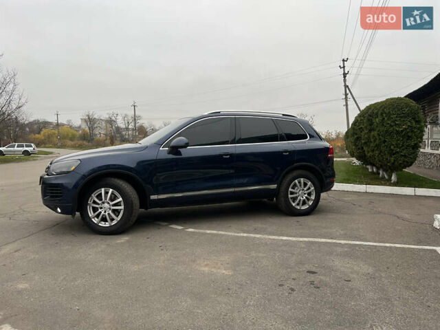 Синий Фольксваген Туарег, объемом двигателя 2.97 л и пробегом 257 тыс. км за 17850 $, фото 4 на Automoto.ua