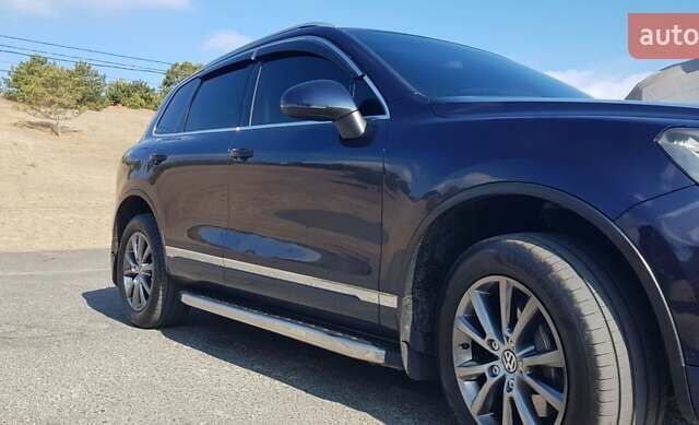 Синий Фольксваген Туарег, объемом двигателя 2.97 л и пробегом 325 тыс. км за 21500 $, фото 19 на Automoto.ua