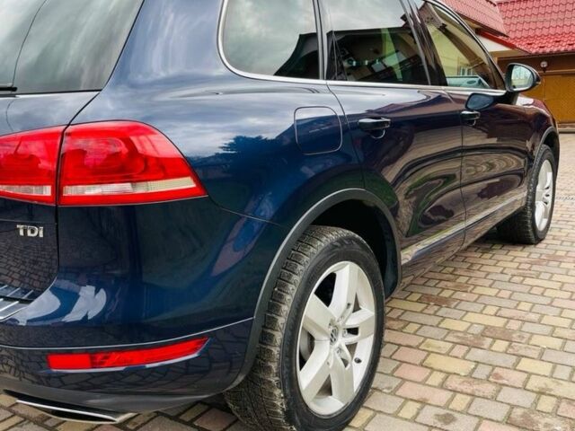 Синий Фольксваген Туарег, объемом двигателя 3 л и пробегом 280 тыс. км за 16600 $, фото 1 на Automoto.ua