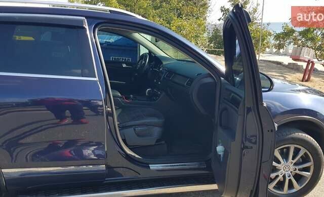 Синий Фольксваген Туарег, объемом двигателя 2.97 л и пробегом 325 тыс. км за 21500 $, фото 22 на Automoto.ua