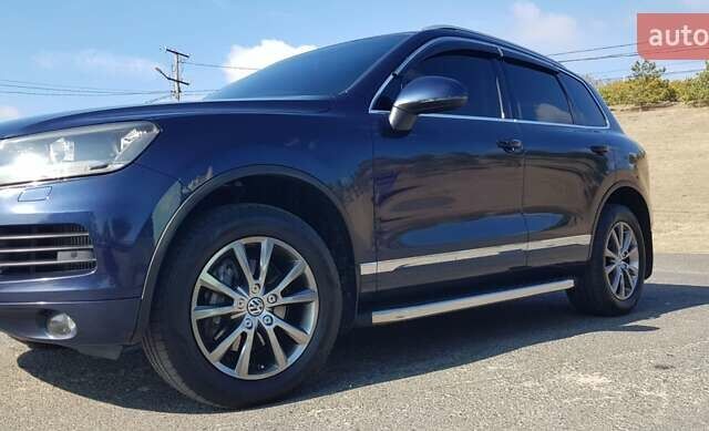 Синий Фольксваген Туарег, объемом двигателя 2.97 л и пробегом 325 тыс. км за 21500 $, фото 17 на Automoto.ua