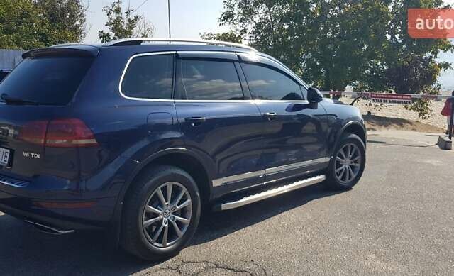 Синий Фольксваген Туарег, объемом двигателя 2.97 л и пробегом 325 тыс. км за 21500 $, фото 2 на Automoto.ua