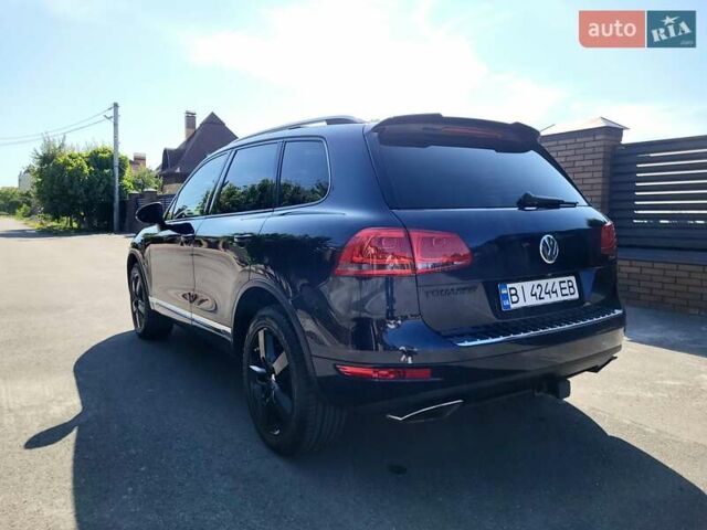 Синий Фольксваген Туарег, объемом двигателя 2.97 л и пробегом 221 тыс. км за 21400 $, фото 14 на Automoto.ua