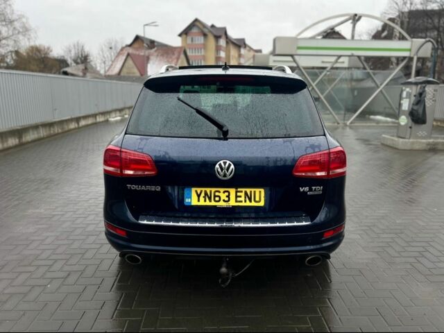 Синий Фольксваген Туарег, объемом двигателя 3 л и пробегом 180 тыс. км за 10781 $, фото 4 на Automoto.ua