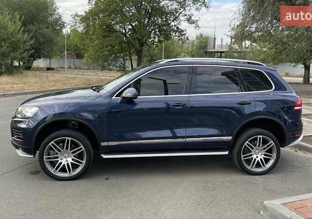 Синий Фольксваген Туарег, объемом двигателя 2.97 л и пробегом 257 тыс. км за 22999 $, фото 3 на Automoto.ua