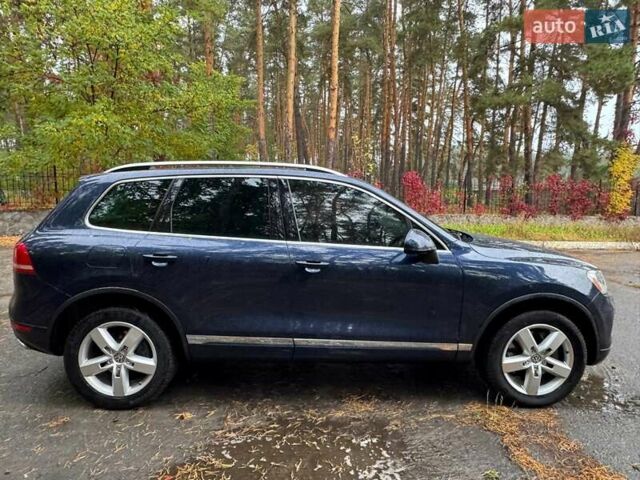 Синий Фольксваген Туарег, объемом двигателя 3 л и пробегом 127 тыс. км за 16300 $, фото 4 на Automoto.ua