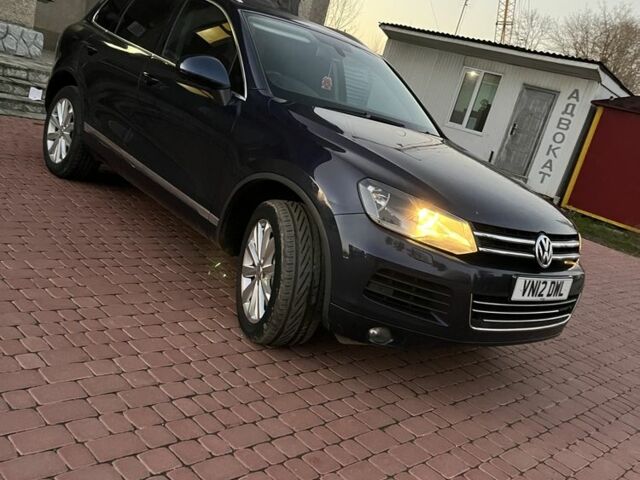 Синий Фольксваген Туарег, объемом двигателя 3 л и пробегом 150 тыс. км за 8595 $, фото 1 на Automoto.ua