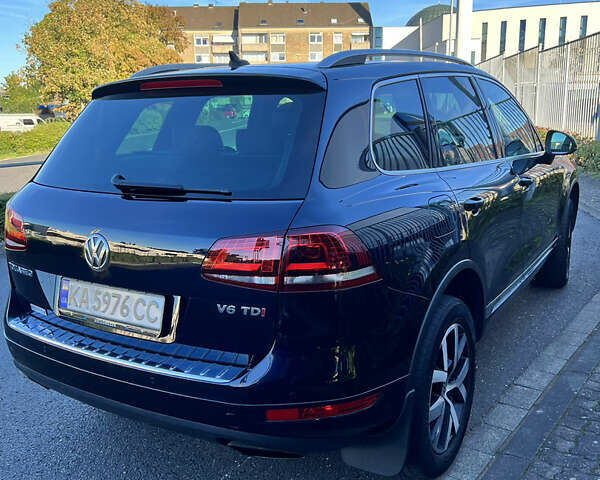 Фольксваген Туарег 2013 в Харькове на Automoto.ua Синий Фольксваген Туарег, объемом двигателя 2.97 л и пробегом 153 тыс. км за 29500 $, фото 1 на Automoto.ua