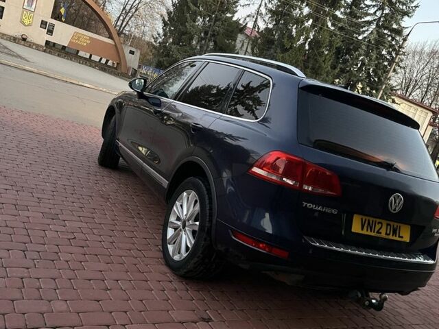 Синий Фольксваген Туарег, объемом двигателя 3 л и пробегом 150 тыс. км за 8595 $, фото 3 на Automoto.ua