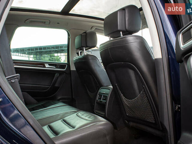 Синий Фольксваген Туарег, объемом двигателя 3 л и пробегом 211 тыс. км за 15700 $, фото 40 на Automoto.ua