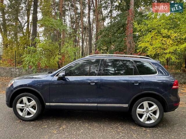 Синий Фольксваген Туарег, объемом двигателя 3 л и пробегом 127 тыс. км за 16300 $, фото 3 на Automoto.ua