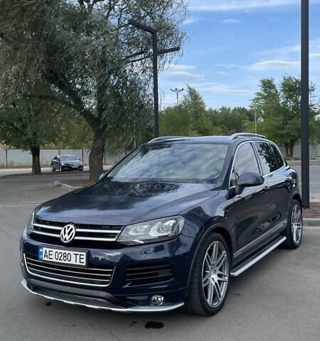 Синий Фольксваген Туарег, объемом двигателя 2.97 л и пробегом 257 тыс. км за 22999 $, фото 1 на Automoto.ua