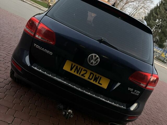 Синий Фольксваген Туарег, объемом двигателя 3 л и пробегом 150 тыс. км за 8595 $, фото 4 на Automoto.ua