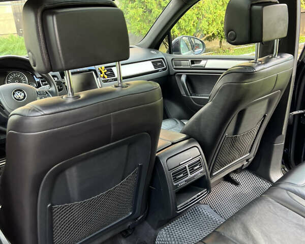 Синій Фольксваген Туарег, об'ємом двигуна 2.97 л та пробігом 250 тис. км за 21100 $, фото 13 на Automoto.ua