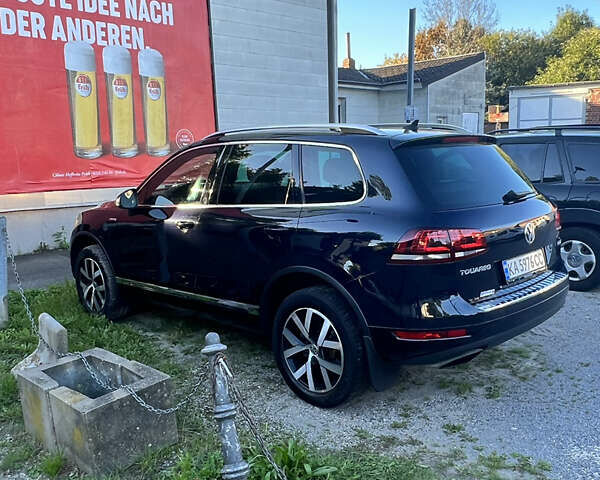 Фольксваген Туарег 2013 в Харькове на Automoto.ua Синий Фольксваген Туарег, объемом двигателя 2.97 л и пробегом 153 тыс. км за 29500 $, фото 6 на Automoto.ua