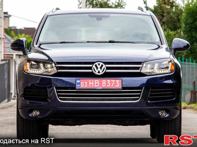 Синий Фольксваген Туарег, объемом двигателя 3 л и пробегом 211 тыс. км за 15700 $, фото 4 на Automoto.ua