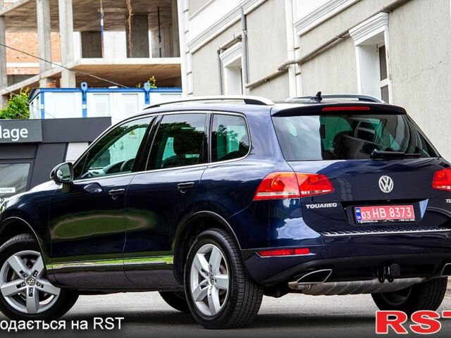 Синий Фольксваген Туарег, объемом двигателя 3 л и пробегом 211 тыс. км за 15700 $, фото 2 на Automoto.ua