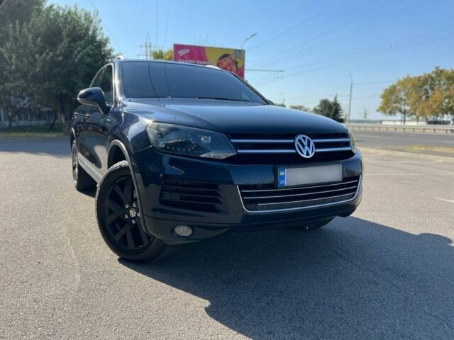 Синий Фольксваген Туарег, объемом двигателя 3 л и пробегом 250 тыс. км за 23500 $, фото 1 на Automoto.ua