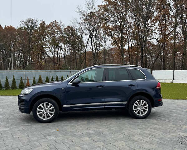 Синій Фольксваген Туарег, об'ємом двигуна 2.97 л та пробігом 237 тис. км за 23000 $, фото 2 на Automoto.ua