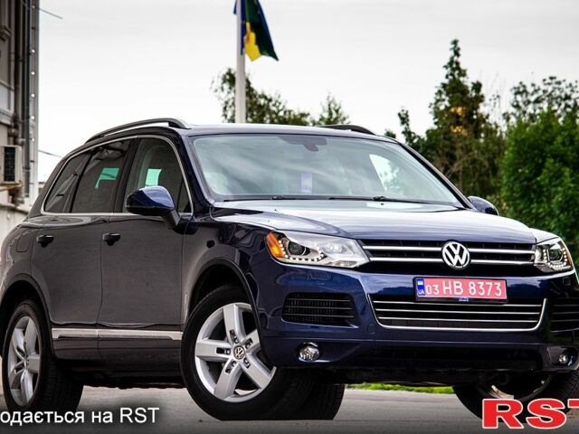 Синий Фольксваген Туарег, объемом двигателя 3 л и пробегом 211 тыс. км за 15700 $, фото 1 на Automoto.ua