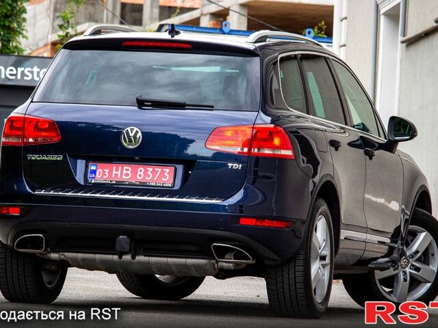 Синий Фольксваген Туарег, объемом двигателя 3 л и пробегом 211 тыс. км за 15700 $, фото 3 на Automoto.ua