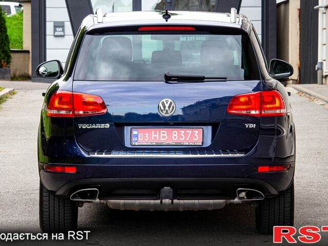 Синий Фольксваген Туарег, объемом двигателя 3 л и пробегом 211 тыс. км за 15700 $, фото 5 на Automoto.ua