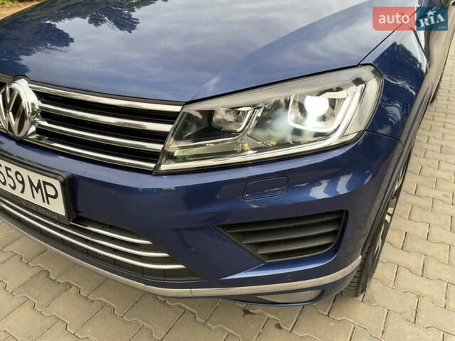 Синій Фольксваген Туарег, об'ємом двигуна 2.97 л та пробігом 288 тис. км за 23145 $, фото 2 на Automoto.ua