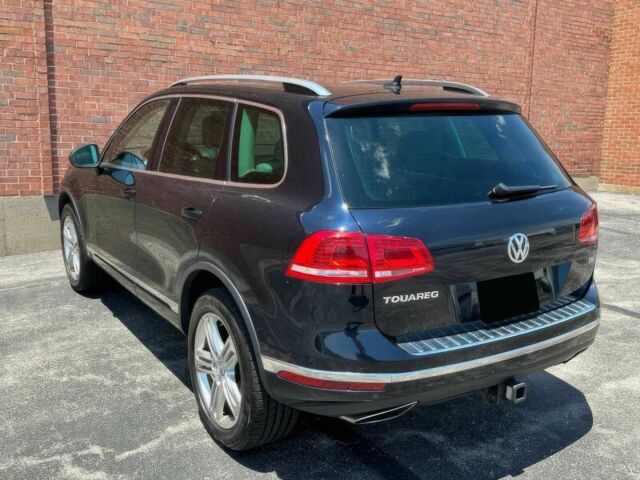 Синий Фольксваген Туарег, объемом двигателя 3 л и пробегом 71 тыс. км за 14100 $, фото 5 на Automoto.ua