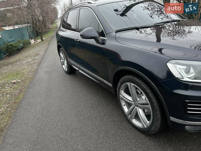 Синій Фольксваген Туарег, об'ємом двигуна 2.97 л та пробігом 203 тис. км за 27479 $, фото 2 на Automoto.ua