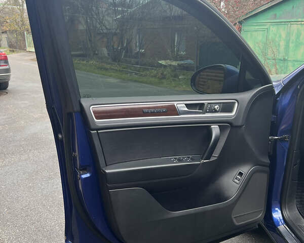 Синий Фольксваген Туарег, объемом двигателя 2.97 л и пробегом 190 тыс. км за 24800 $, фото 23 на Automoto.ua