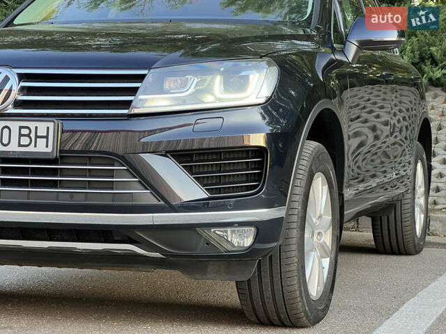 Синий Фольксваген Туарег, объемом двигателя 3 л и пробегом 102 тыс. км за 35900 $, фото 1 на Automoto.ua