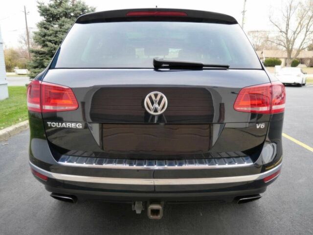 Синий Фольксваген Туарег, объемом двигателя 3 л и пробегом 73 тыс. км за 13000 $, фото 4 на Automoto.ua