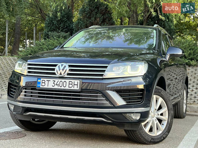 Синий Фольксваген Туарег, объемом двигателя 3 л и пробегом 102 тыс. км за 35900 $, фото 3 на Automoto.ua