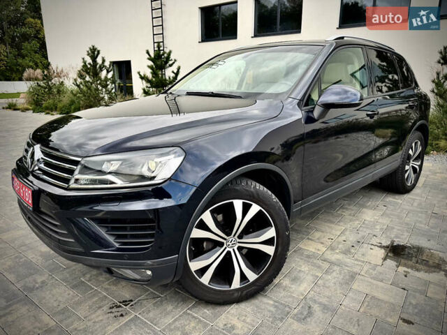 Синий Фольксваген Туарег, объемом двигателя 3 л и пробегом 182 тыс. км за 24900 $, фото 1 на Automoto.ua