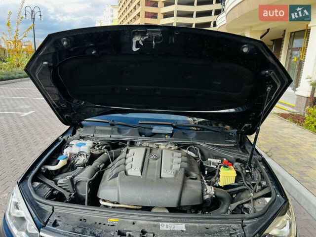 Синий Фольксваген Туарег, объемом двигателя 3 л и пробегом 182 тыс. км за 24900 $, фото 56 на Automoto.ua