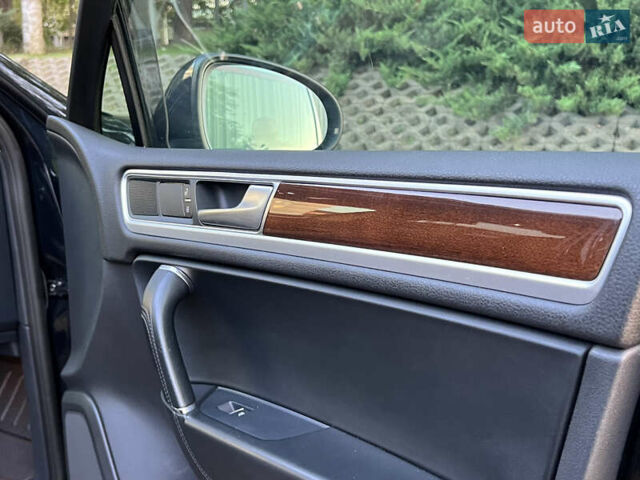 Синий Фольксваген Туарег, объемом двигателя 3 л и пробегом 102 тыс. км за 35900 $, фото 38 на Automoto.ua