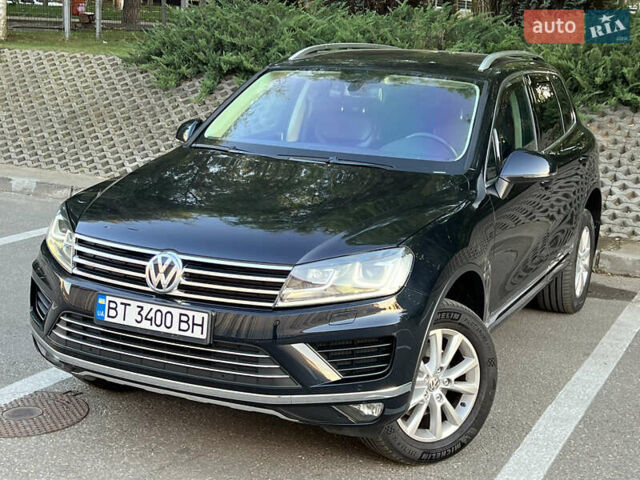 Синий Фольксваген Туарег, объемом двигателя 3 л и пробегом 102 тыс. км за 35900 $, фото 2 на Automoto.ua