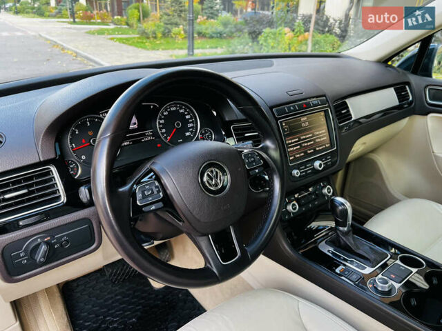 Синий Фольксваген Туарег, объемом двигателя 3 л и пробегом 182 тыс. км за 24900 $, фото 24 на Automoto.ua