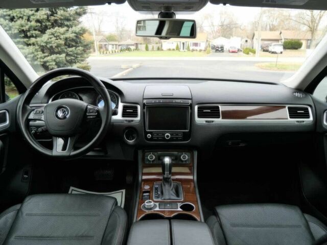 Синий Фольксваген Туарег, объемом двигателя 3 л и пробегом 73 тыс. км за 13000 $, фото 7 на Automoto.ua