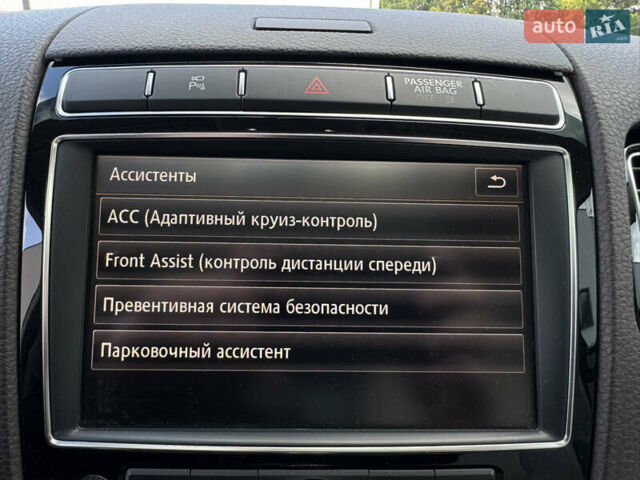 Синий Фольксваген Туарег, объемом двигателя 3 л и пробегом 182 тыс. км за 24900 $, фото 28 на Automoto.ua