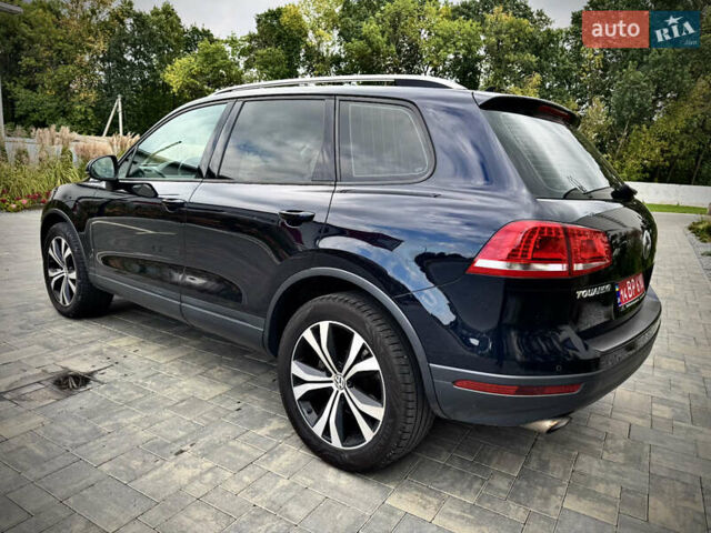 Синий Фольксваген Туарег, объемом двигателя 3 л и пробегом 182 тыс. км за 24900 $, фото 3 на Automoto.ua