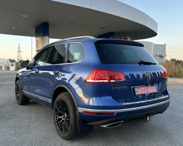 Синій Фольксваген Туарег, об'ємом двигуна 3 л та пробігом 151 тис. км за 24900 $, фото 4 на Automoto.ua