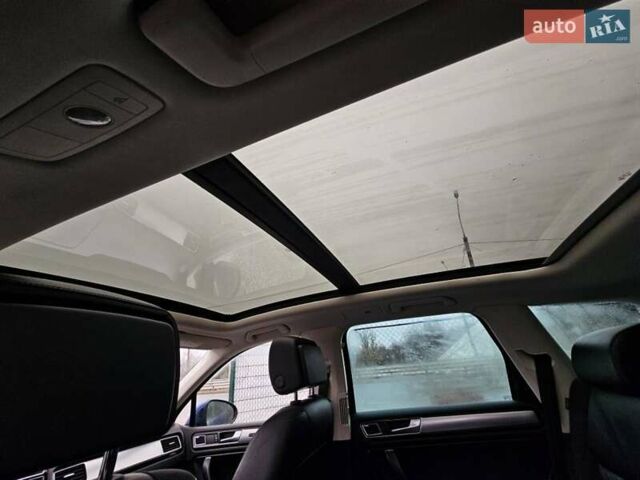 Синій Фольксваген Туарег, об'ємом двигуна 3 л та пробігом 199 тис. км за 27999 $, фото 25 на Automoto.ua