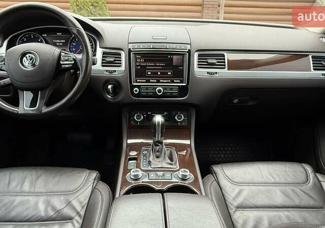 Синий Фольксваген Туарег, объемом двигателя 2.97 л и пробегом 196 тыс. км за 29999 $, фото 76 на Automoto.ua