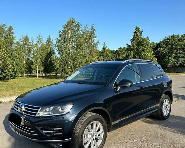 Синий Фольксваген Туарег, объемом двигателя 2.97 л и пробегом 245 тыс. км за 26000 $, фото 1 на Automoto.ua