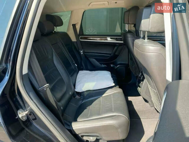 Синий Фольксваген Туарег, объемом двигателя 3 л и пробегом 178 тыс. км за 27900 $, фото 22 на Automoto.ua