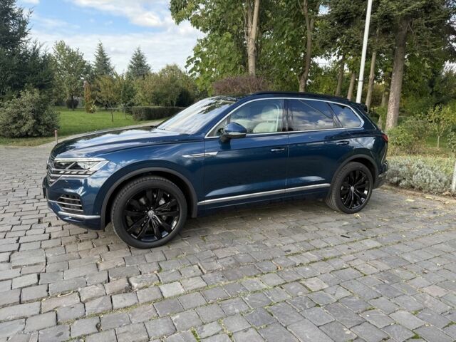 Синий Фольксваген Туарег, объемом двигателя 3 л и пробегом 180 тыс. км за 51000 $, фото 1 на Automoto.ua